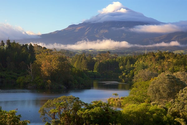Taranaki which includes a lake or waterhole, forest scenes and mountains