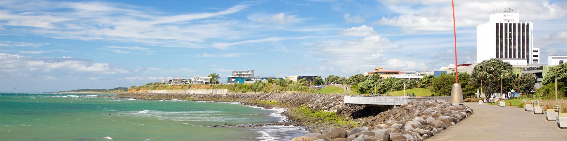 New Plymouth which includes rocky coastline and a bay or harbor