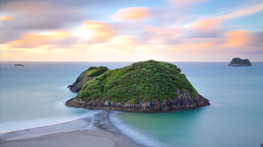 Sugar Loaf Marine Reserve which includes a sunset, a bay or harbor and island views