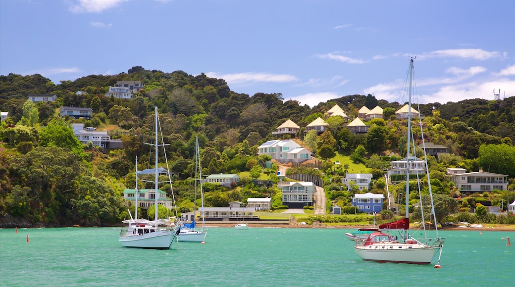 Russell showing a coastal town, a bay or harbour and sailing