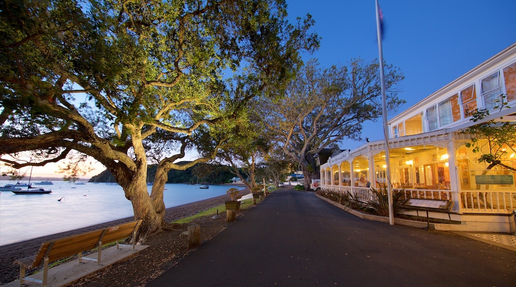 Russell featuring a sunset, café scenes and general coastal views