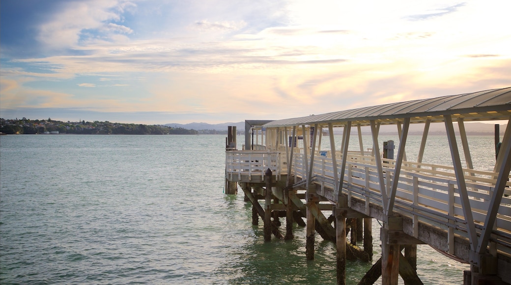 Harbour Bridge showing a bay or harbour and a sunset