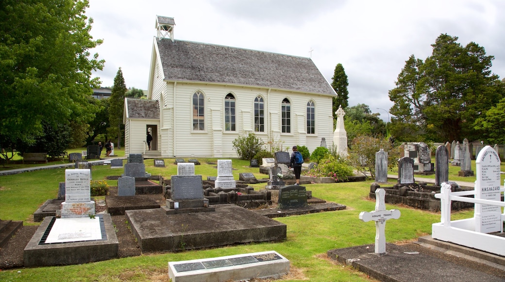 Russell Christ Church featuring a church or cathedral and a cemetery