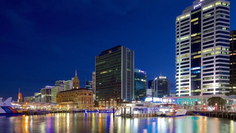 Auckland Ferry Terminal which includes a bay or harbor, a marina and night scenes