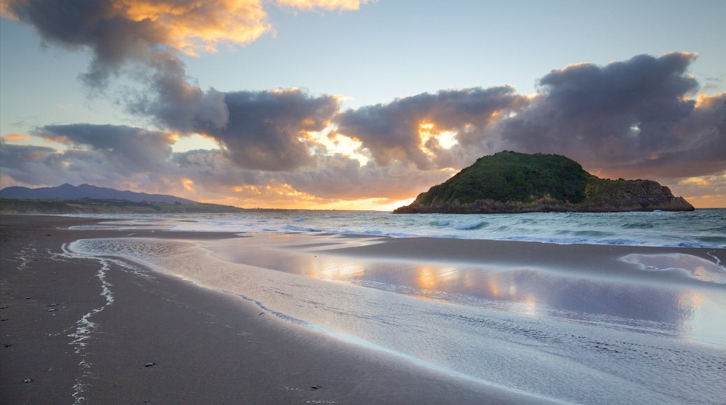 Sugar Loaf Marine Reserve which includes a bay or harbour, island views and a sunset