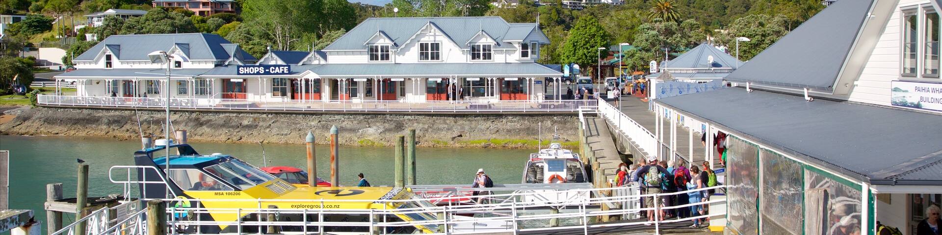 Paihia Wharf featuring a bay or harbour and a coastal town
