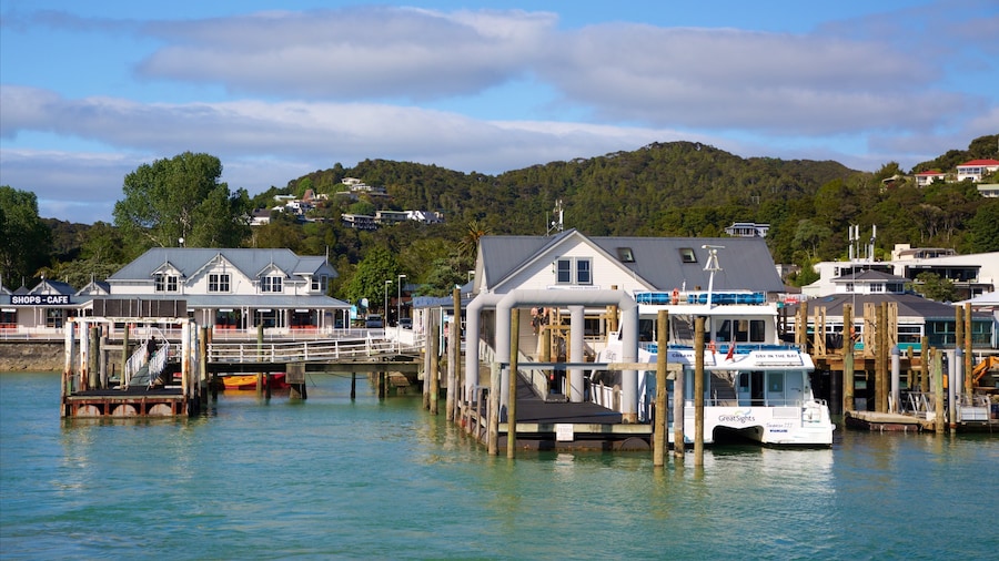 Paihia Wharf featuring a bay or harbour and a coastal town