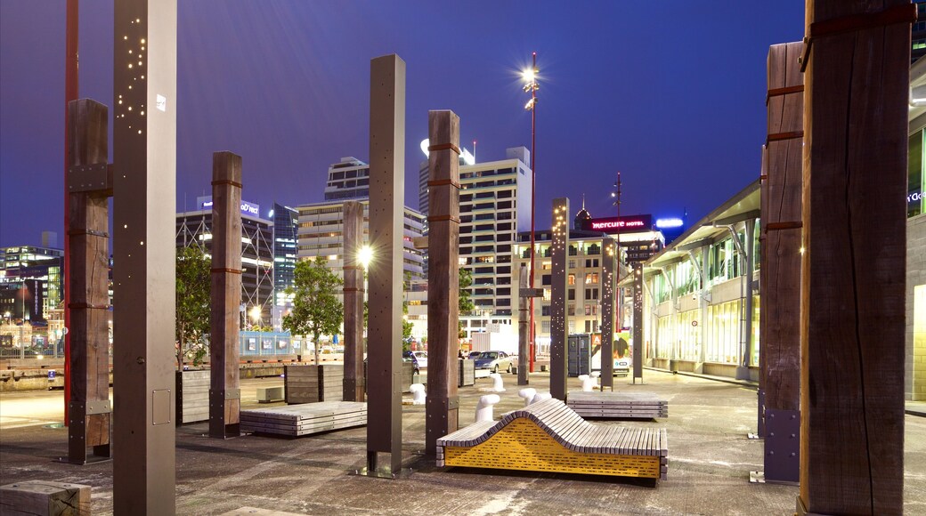 North Island featuring outdoor art, a city and night scenes