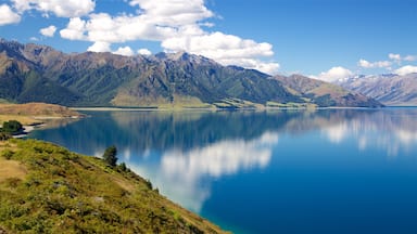 Lake Hawea which includes a lake or waterhole and mountains