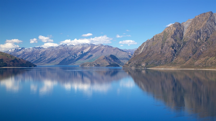 Lake Hawea which includes mountains and a lake or waterhole