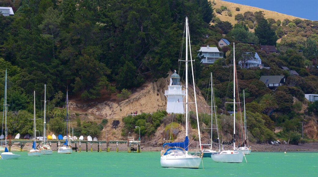 Canterbury showing a coastal town, a lighthouse and general coastal views