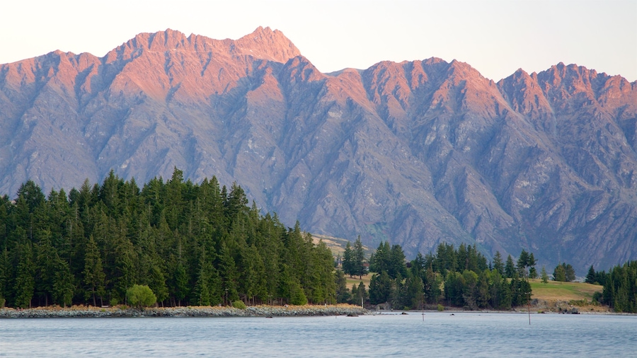 Otago showing mountains, a lake or waterhole and a sunset