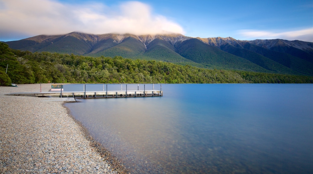 Tasman Region which includes a lake or waterhole and a pebble beach