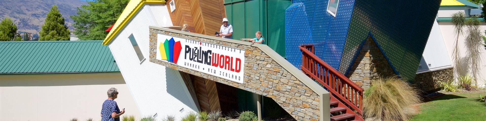 Puzzling World featuring rides as well as an individual female