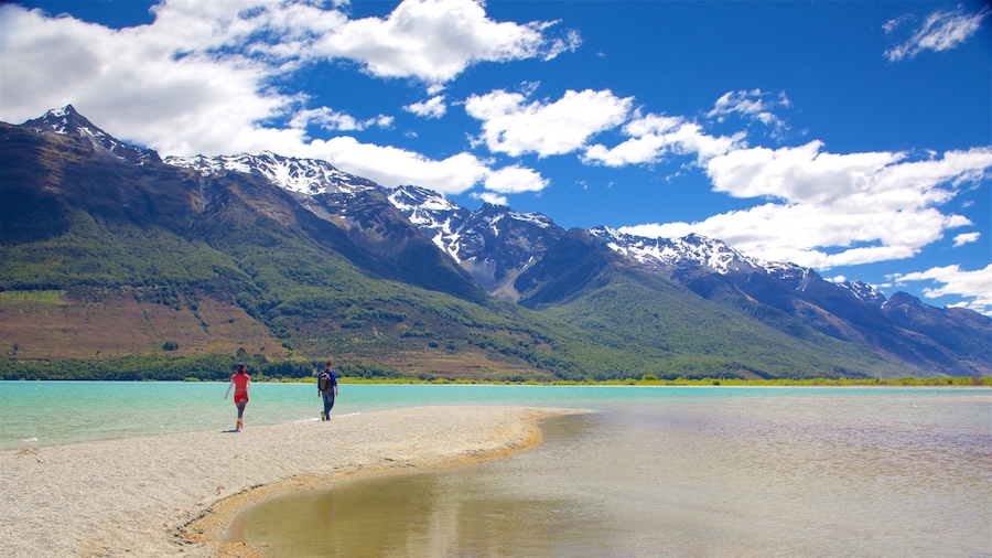 Glenorchy featuring forests, mountains and a pebble beach