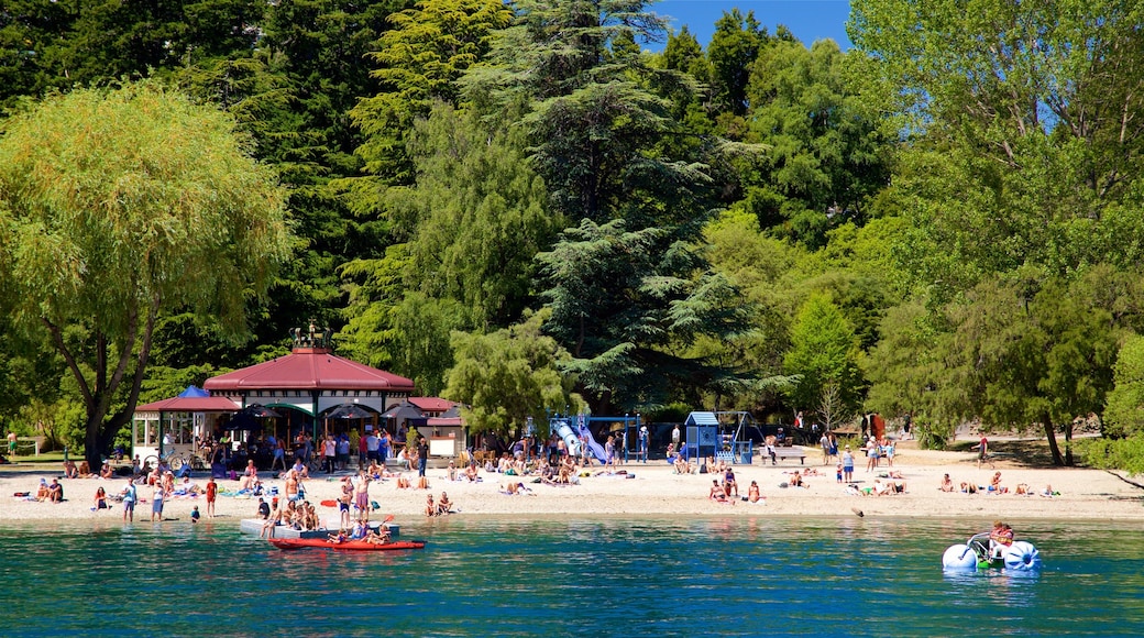 Queenstown Beach showing a pebble beach, kayaking or canoeing and a lake or waterhole