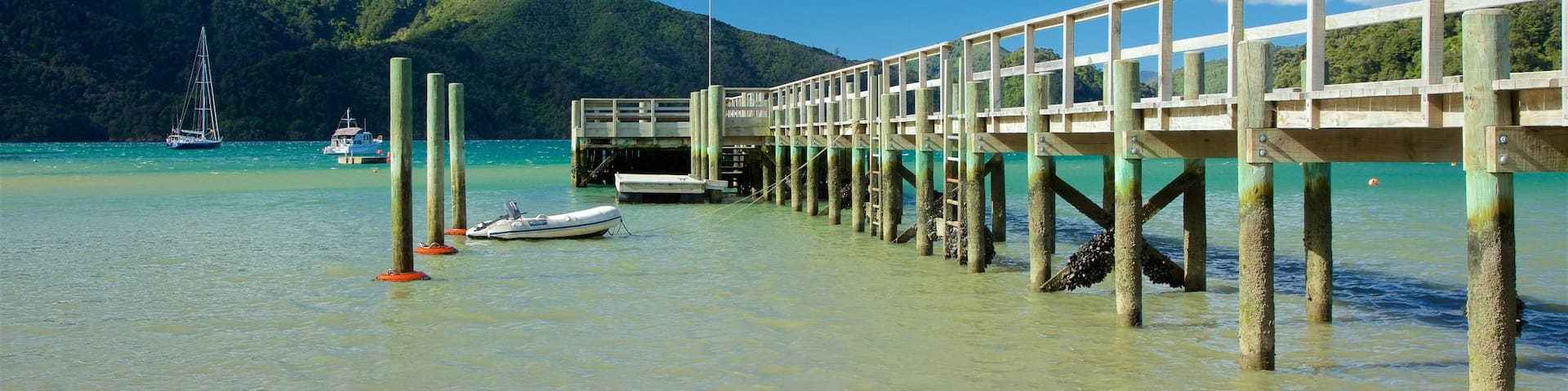Picton which includes a bay or harbor, mountains and sailing