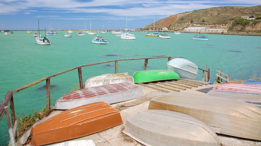 Oamaru showing rocky coastline, a bay or harbour and boating
