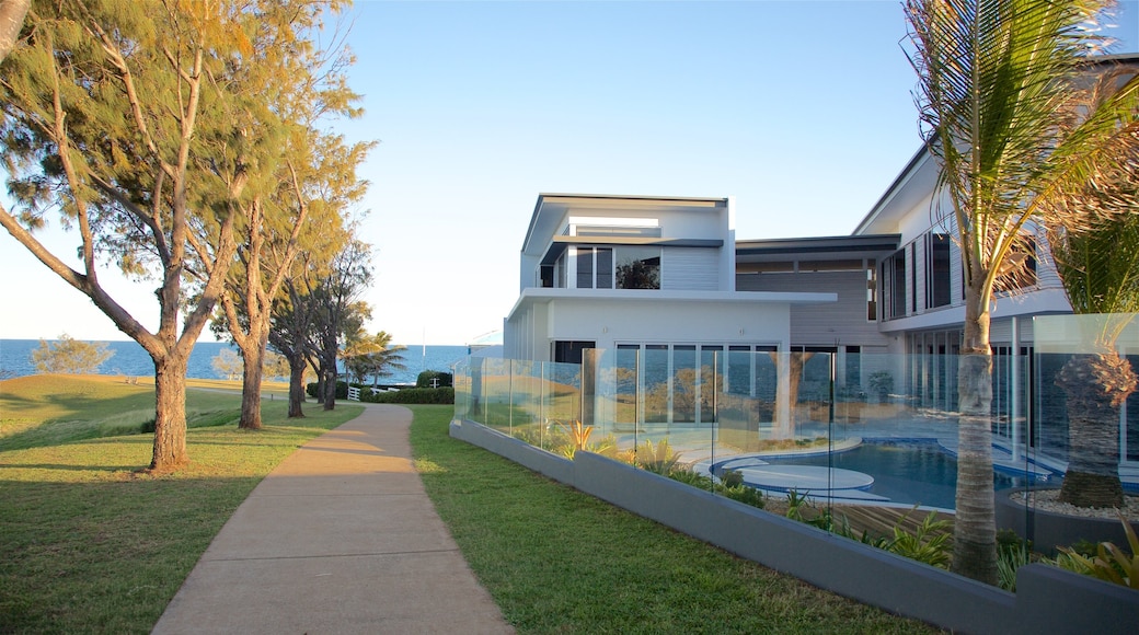 Bargara featuring general coastal views, a sunset and a house