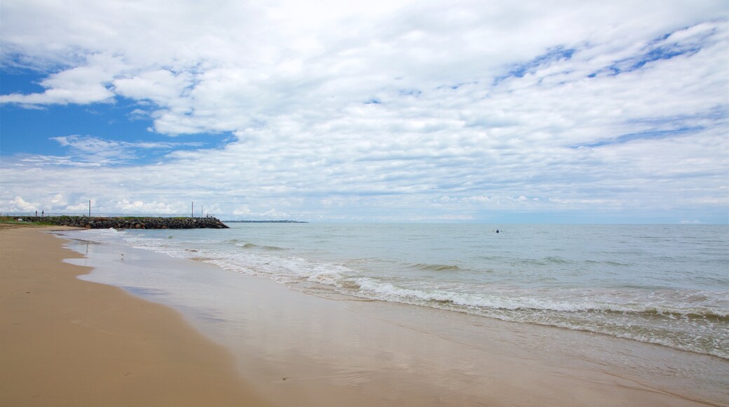 Urangan which includes general coastal views and a beach