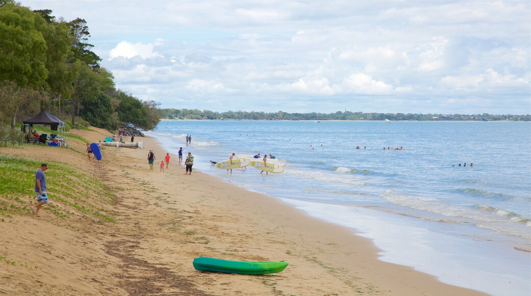 Esplanade showing a beach, general coastal views and swimming