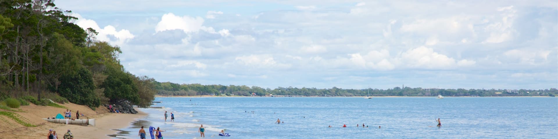Urangan montrant plage, baignade et vues littorales