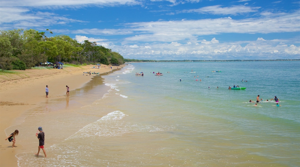 Urangan caracterizando natação, uma praia e paisagens litorùneas