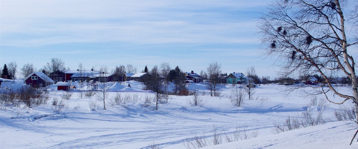 Karesuando which includes tranquil scenes and snow