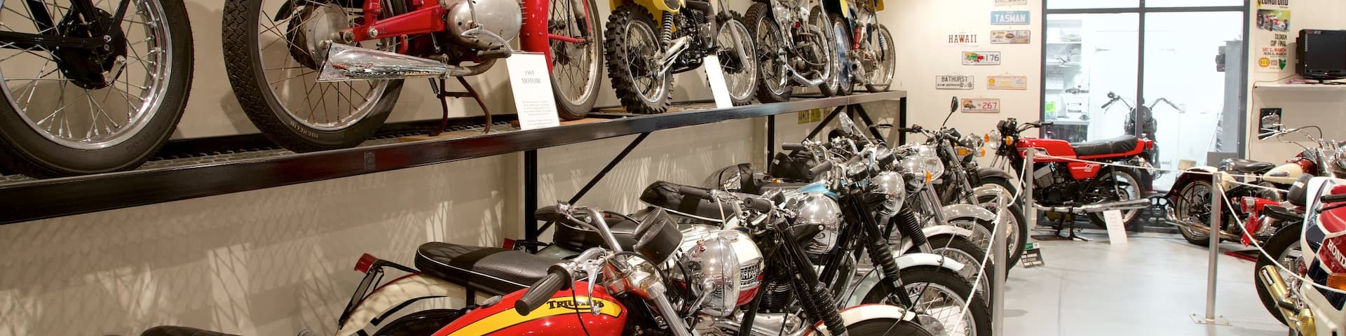 Bicheno\'s Motorcycle Museum & Restoration which includes interior views and heritage elements
