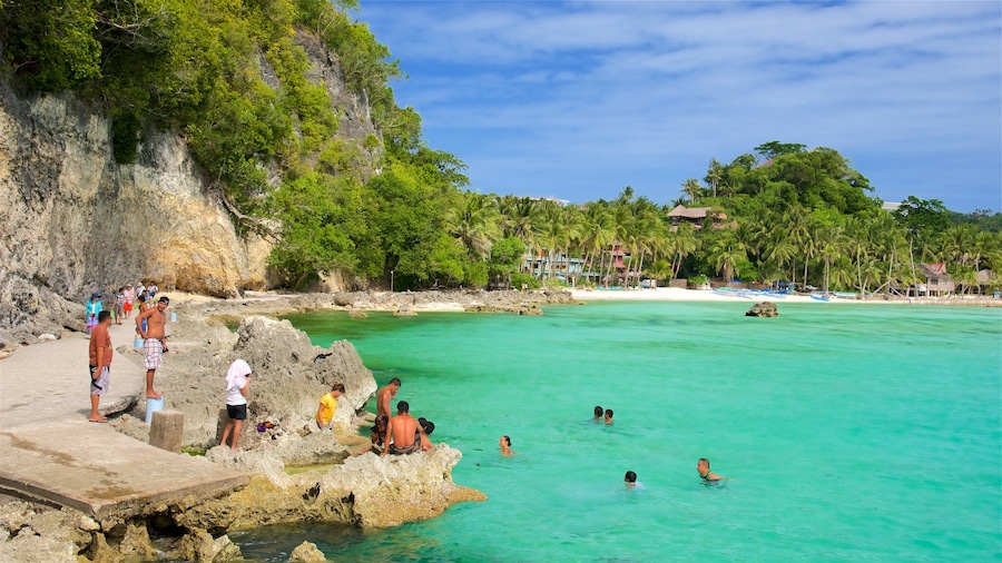 Boracay Island which includes rocky coastline, a bay or harbor and swimming