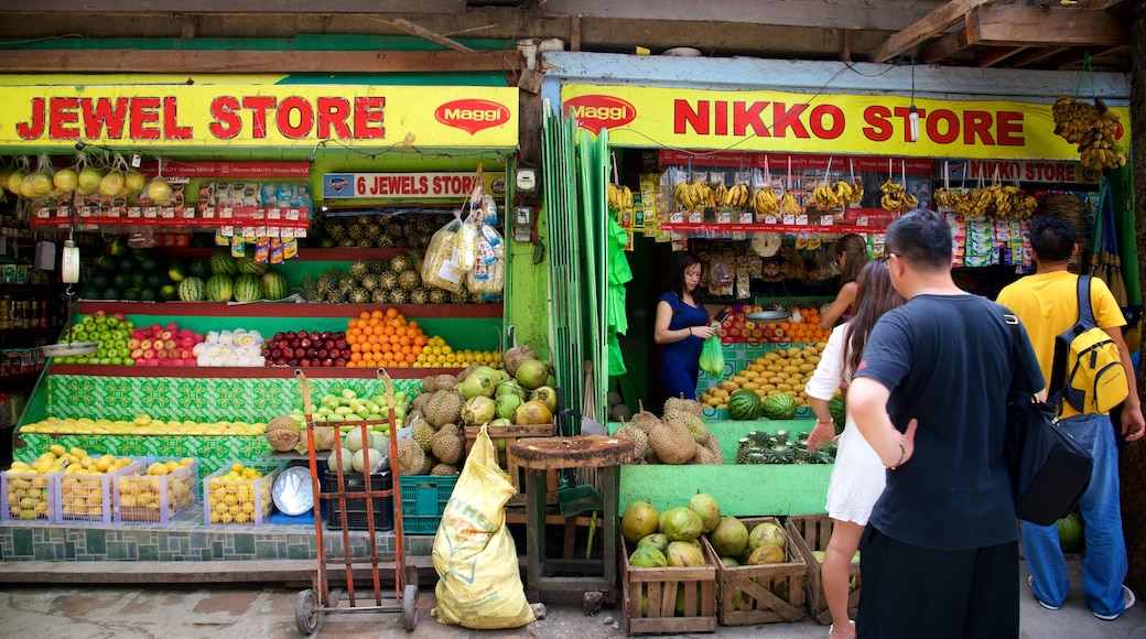 Mercado Talipapa que incluye mercados, comida y señalización