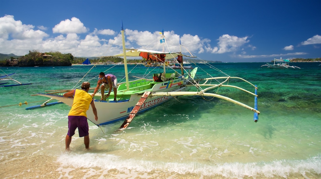 Crystal Cove Island which includes tropical scenes, kayaking or canoeing and a sandy beach