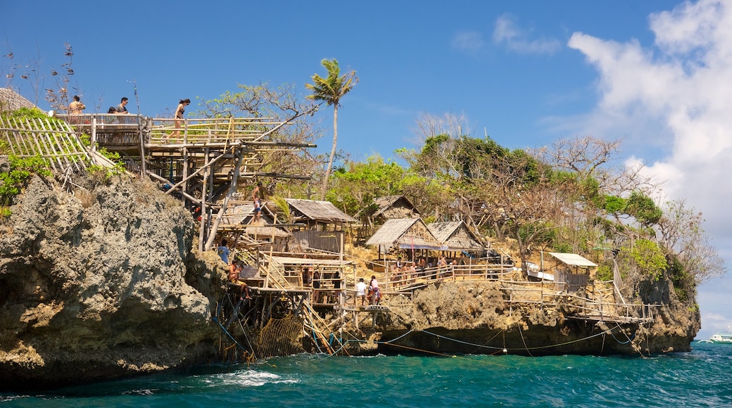 Boracay Island which includes tropical scenes, rugged coastline and views