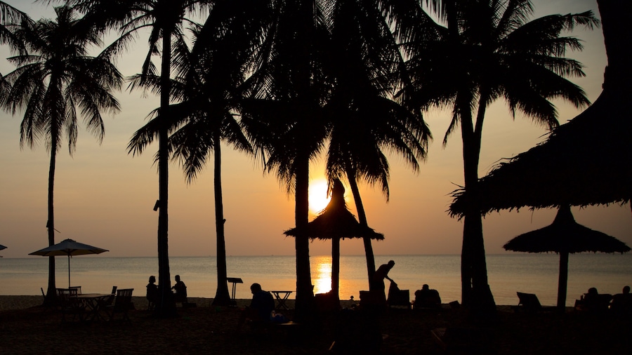 Phu Quoc Island which includes a sunset, tropical scenes and general coastal views
