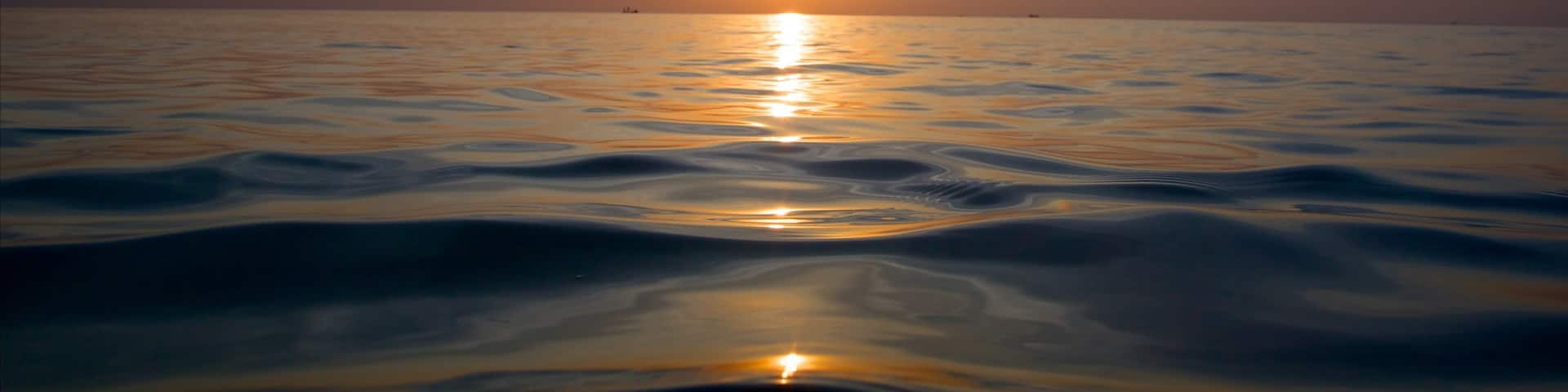 Long Beach featuring general coastal views and a sunset