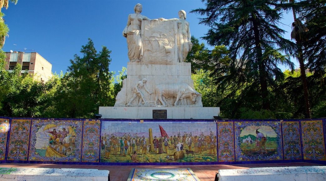 Plaza España che include arte urbana, giardino e statua o scultura