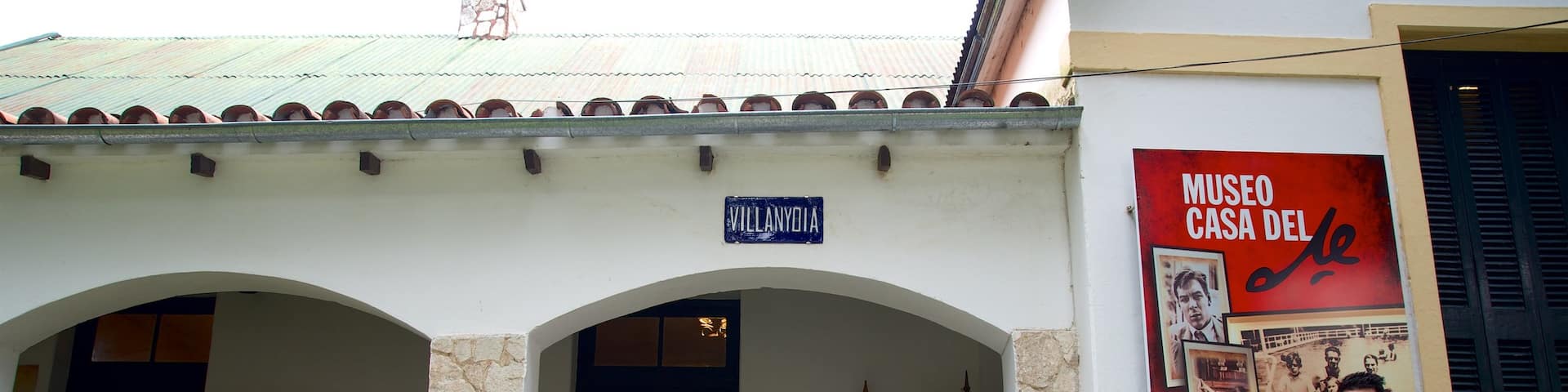 Alta Gracia which includes signage and street scenes as well as an individual male