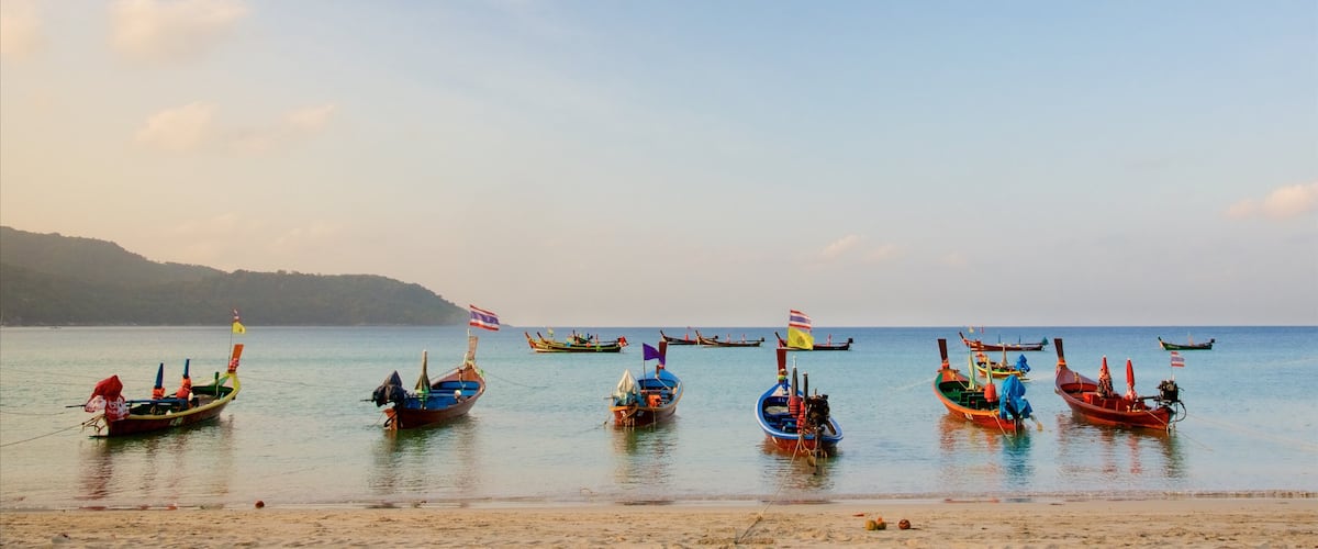 Kata Beach showing a beach, a sunset and boating