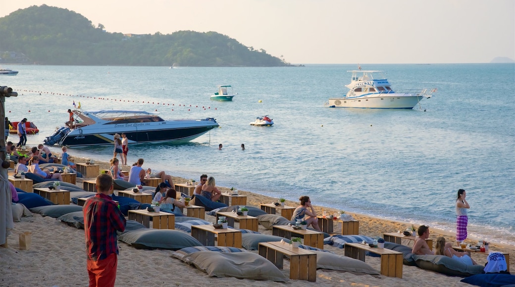 Bo Phut Beach featuring a bay or harbour, a sandy beach and a sunset