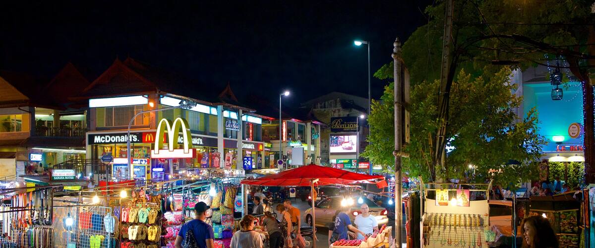Chiang Mai Night Bazaar showing street scenes, signage and night scenes