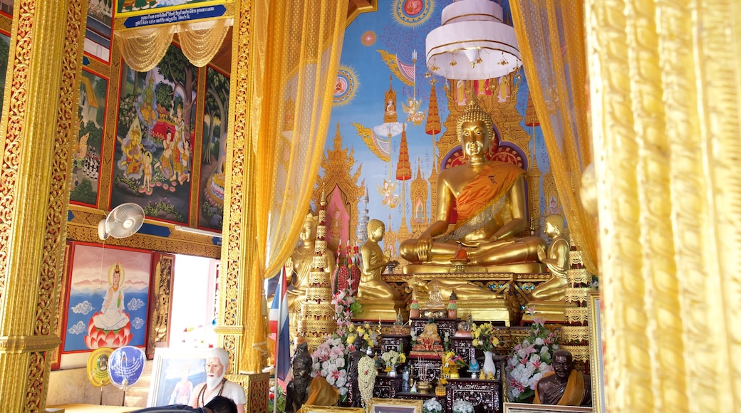 Chiang Mai featuring interior views and a temple or place of worship