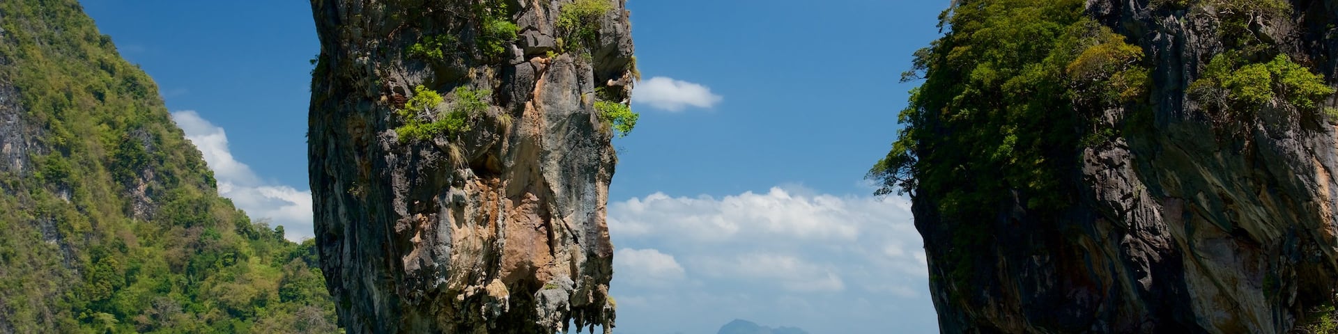 Phang Nga showing a bay or harbour and rugged coastline
