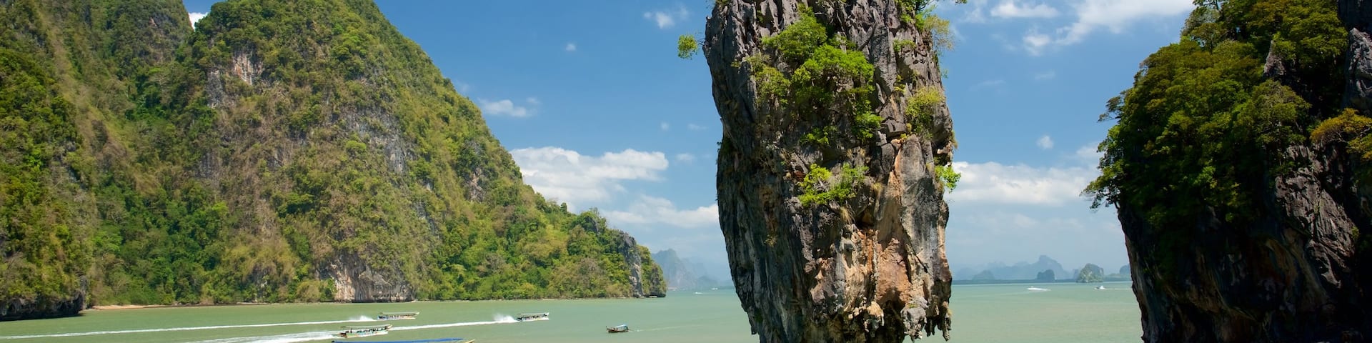 Khao Phing Kan which includes general coastal views, tropical scenes and island images