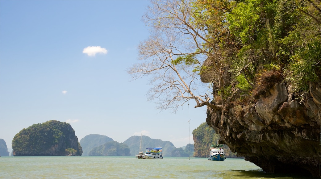 Phang Nga showing a bay or harbor, rugged coastline and boating