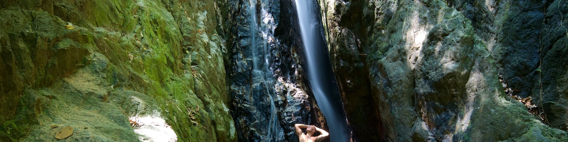 Phuket featuring a river or creek and a cascade as well as a couple
