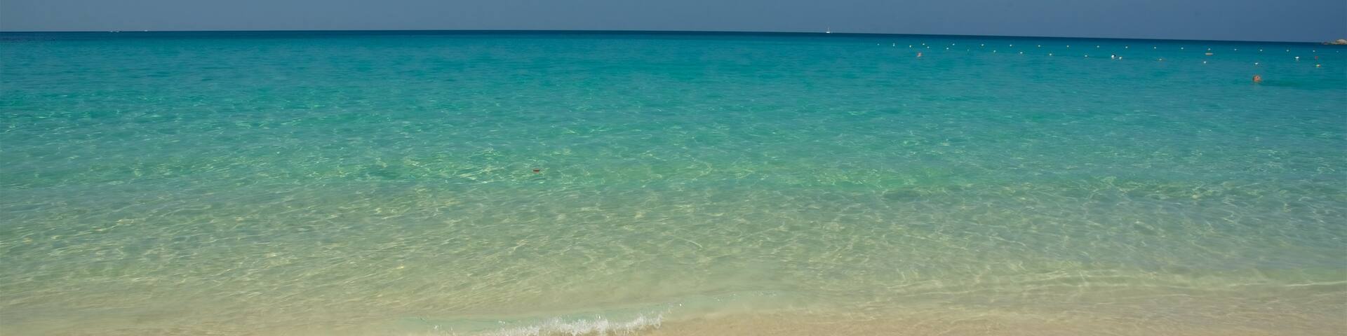 Phuket featuring a sandy beach and a bay or harbour