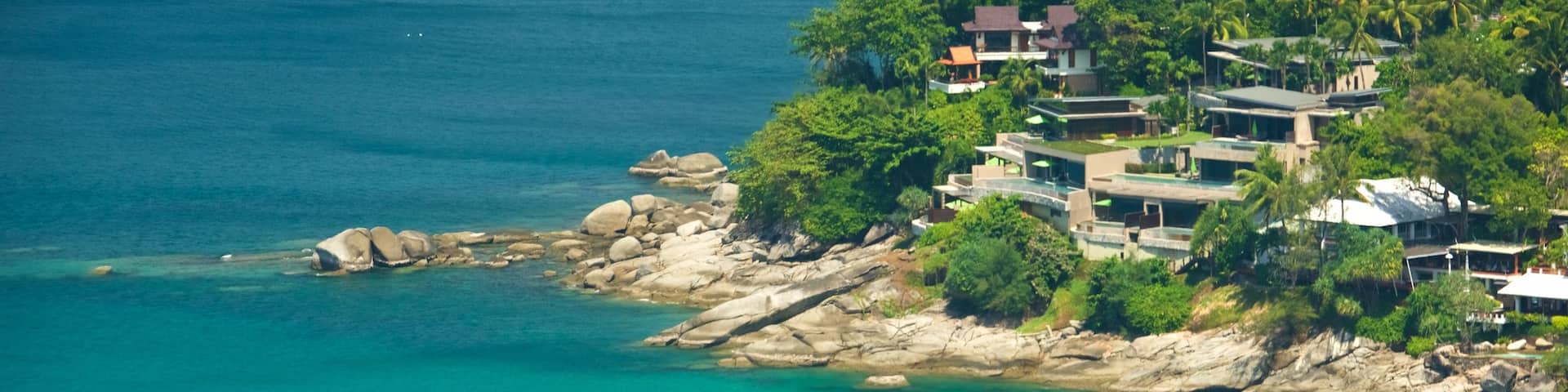 Phuket - Phang Nga featuring a bay or harbor, a coastal town and rocky coastline