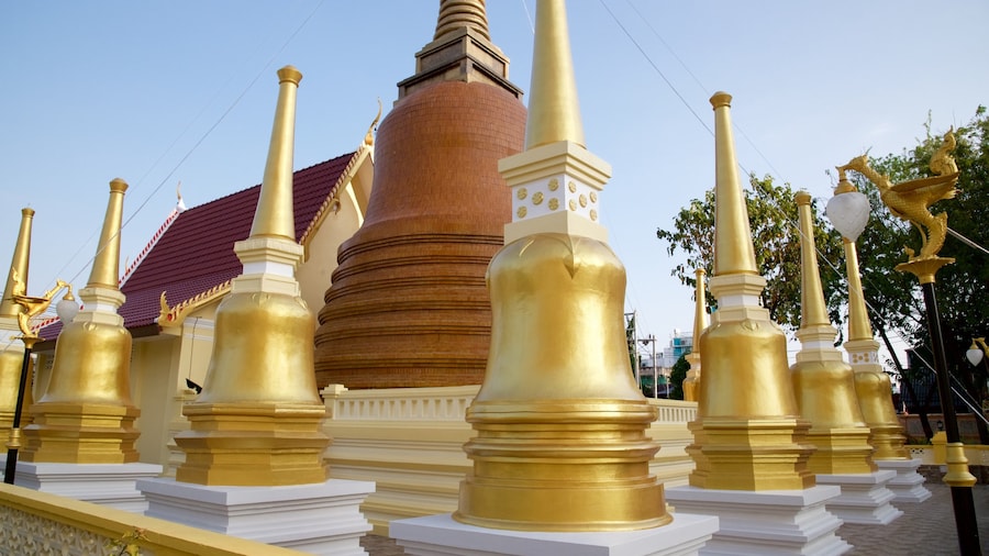 Phuket which includes a temple or place of worship