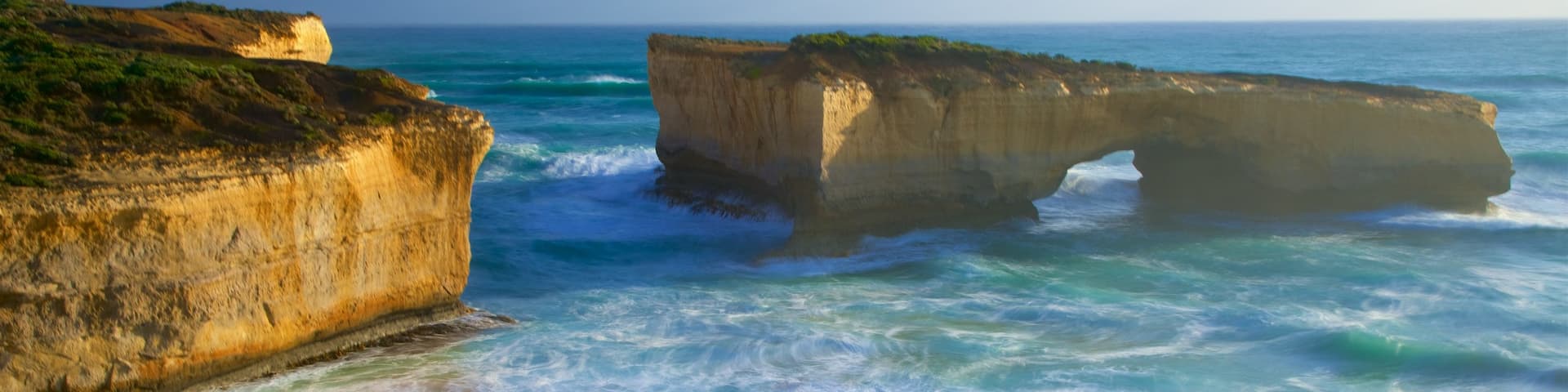 Southwest Victoria featuring a beach and rugged coastline