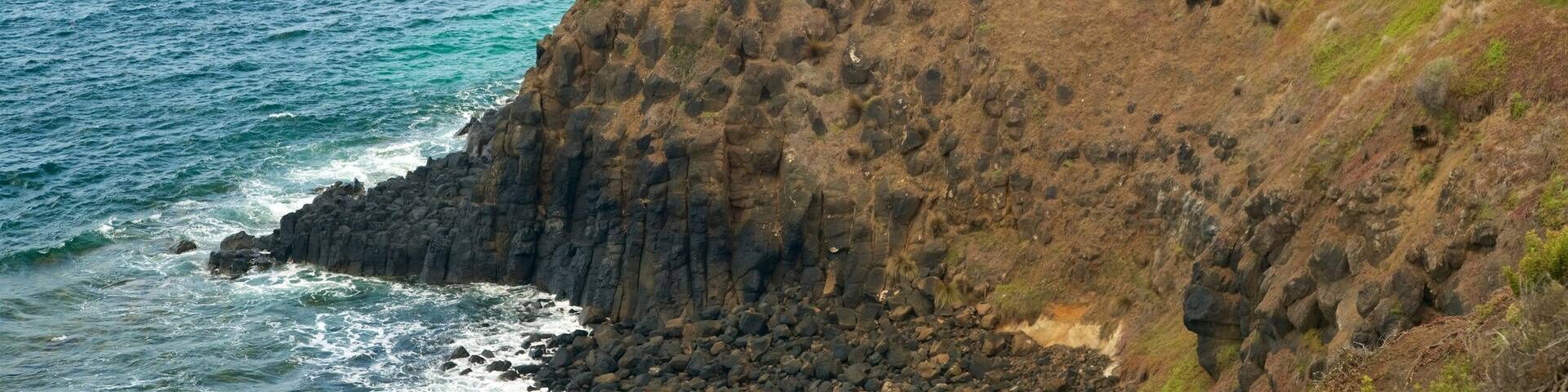 Pyramid Rock which includes rocky coastline
